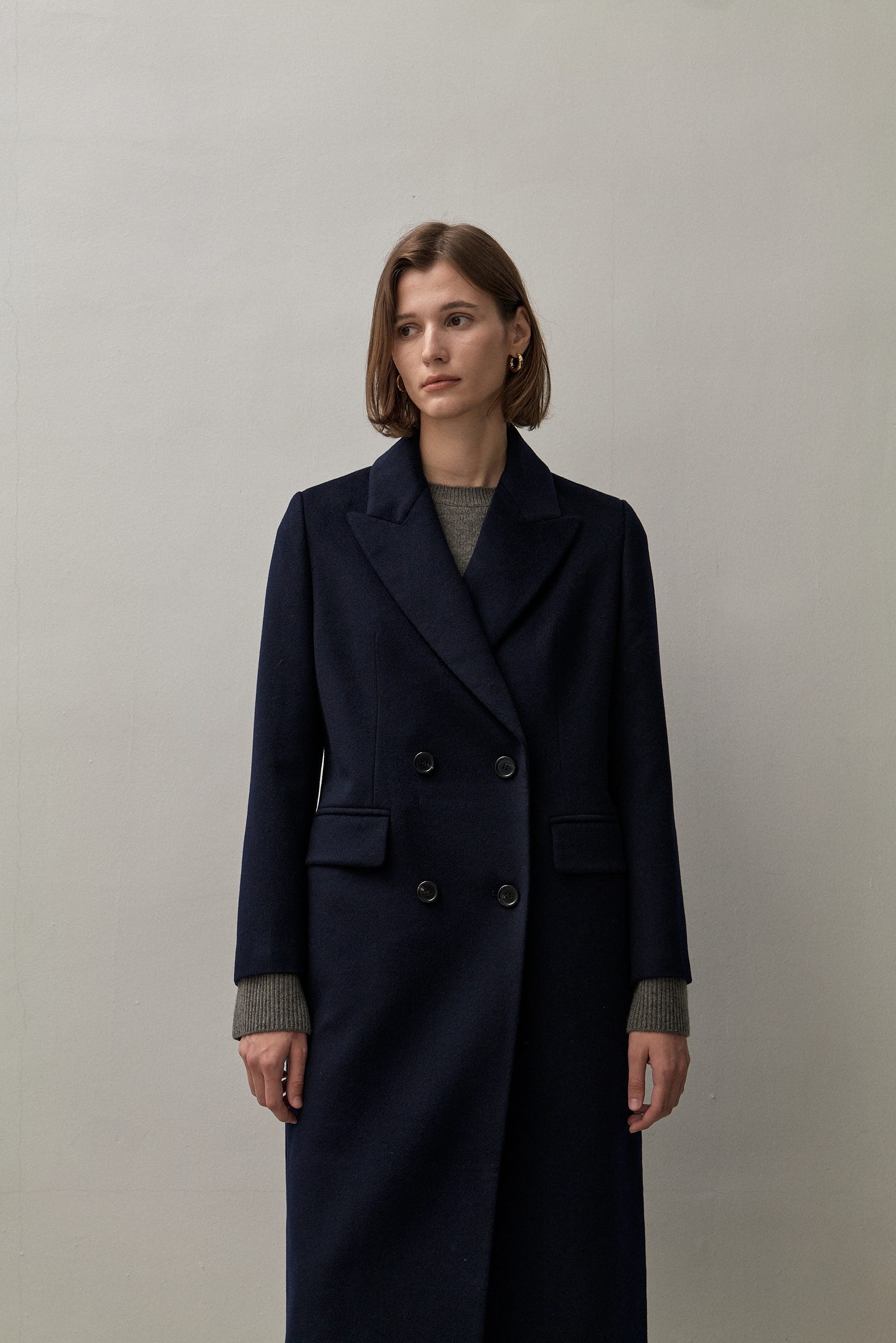 Long navy wool store coat